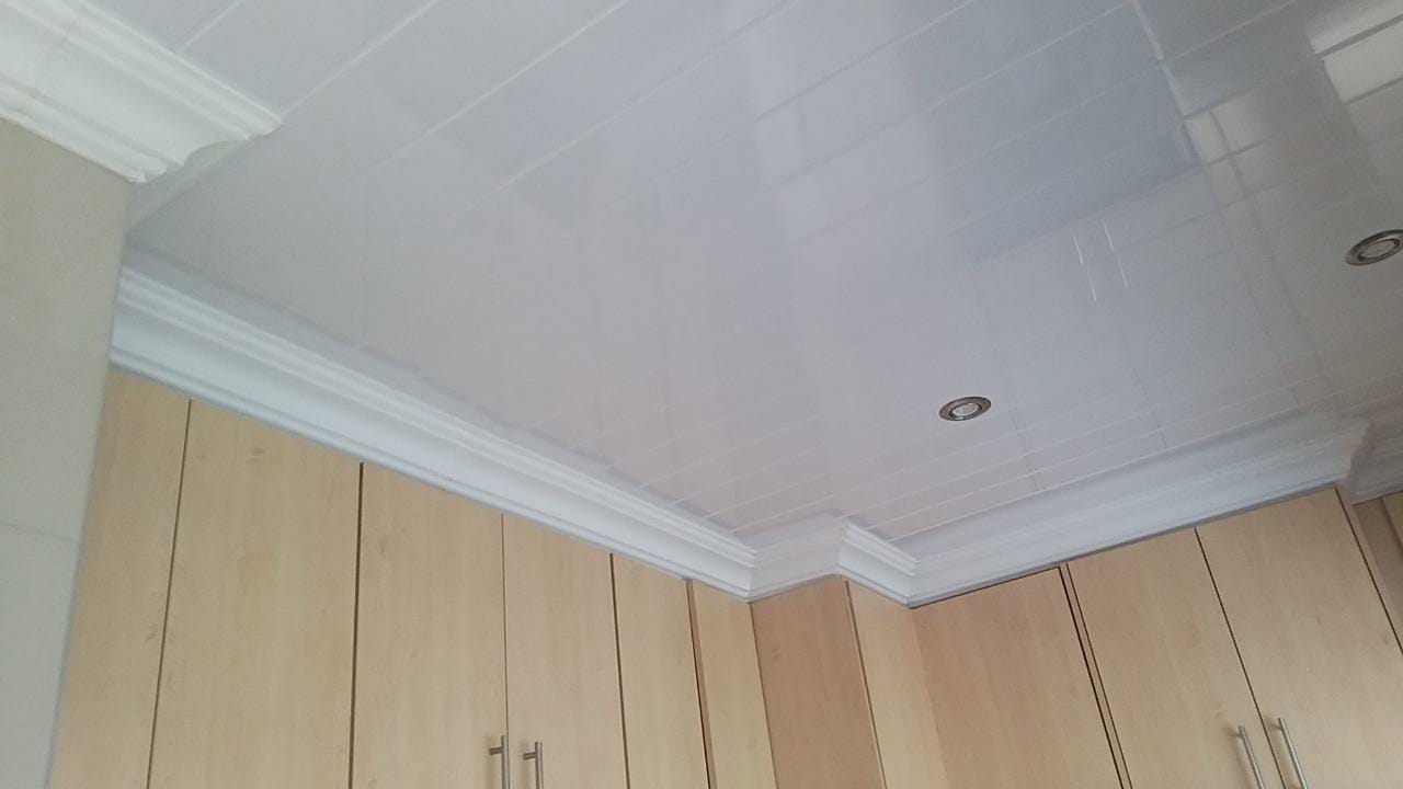 PVC Glossy white grooved ceiling